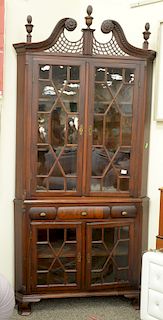 Mahogany Victorian corner china cabinet with pierced broken arch top, four doors, late 19th century, ht. 93 in., wd. 44 in.