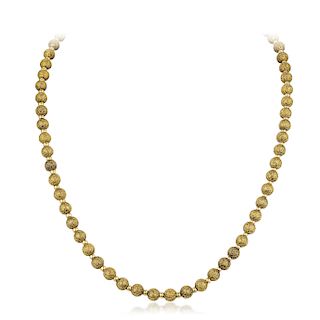 A Textured Gold Bead Necklace
