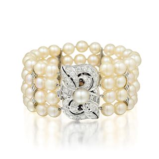 A Four Strand Cultured Pearl and Diamond Bracelet