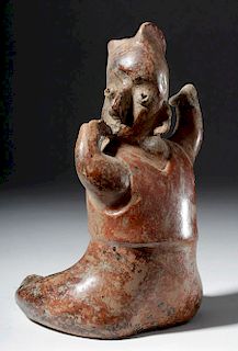 Colima Redware Seated Figure  of a Child Shaman