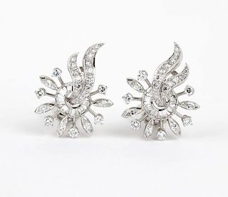 A pair of diamond and platinum earclips