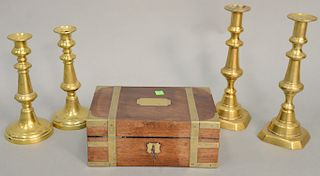 Five piece group to include two pairs of brass pushup candlesticks, and mahogany brass bound box. candlestick ht. 9 in., 10 3/4 in. 