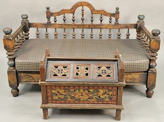 Two piece group to include a primitive spindle day bed and a carved painted chest. bed lg. 63 in. 