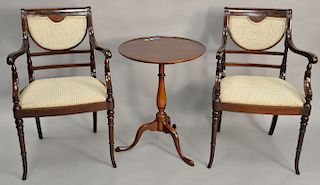 Three piece group to include Margolis mahogany candle stand and a pair of arm chairs, ht. 26 in., dia. 20 in. 