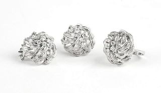 A set of white gold and diamond accent jewelry