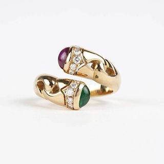 A gold, ruby and emerald bypass ring, Bulgari