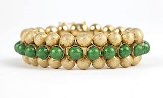A gold and green enamel bracelet