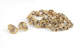 A set of bi-color textured link gold jewelry