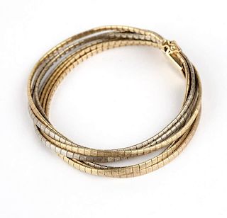 A tri-tone gold Florentine finish bracelet