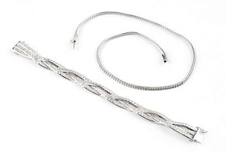 A white gold necklace and bracelet