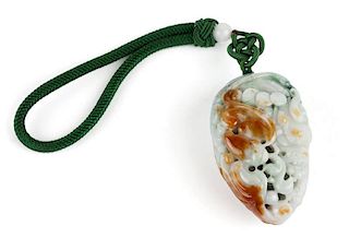 A carved jadeite jade tassel on cord