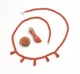 A collection of coral jewelry
