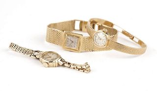 Group of three lady's gold wristwatches