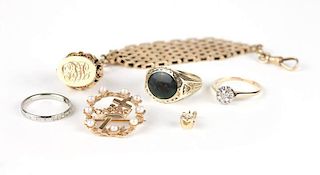 A collection of diamond, stone and gold jewelry