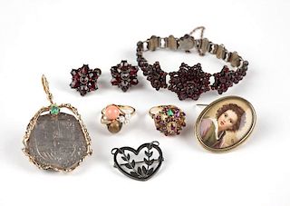 A group of various gem, gold and metal jewelry