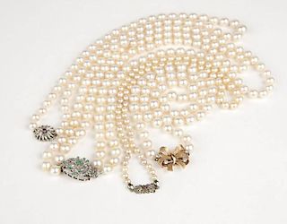 A group of cultured pearl necklaces