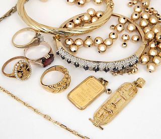 A group of various gold jewelry