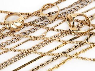 A large group of gold jewelry