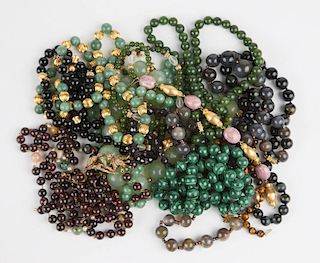 A large collection of beaded necklaces