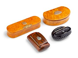A Collection of Four Continental Carved Wood Snuf