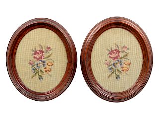 A Pair of Needlepoints<br>of oval form in matchin