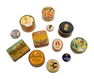 A Collection of Twelve Tins<br>Width widest 3 3/4