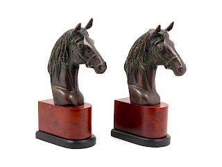 A Pair of Cast Metal Busts of Horses<br>Height 12