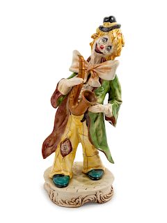 An Italian Ceramic Figure<br>depicting a clown wi