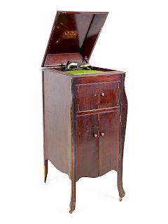 A Victrola<br>20TH CENTURY<br>accompanied by a co