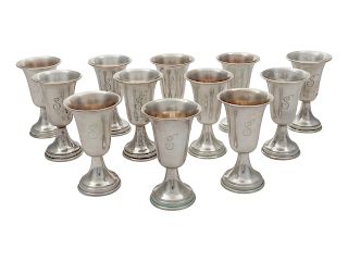 A Group of 12 American Silver Cordials<br>Height 