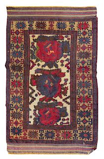 A Caucasian Wool Rug<br>EARLY 20TH CENTURY<br>5 f