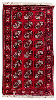 A Bokhara Wool Rug <br>20TH CENTURY<br>6 feet 7 i