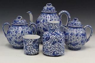 Group of Japanese blue and white porcelain pieces, marked.
