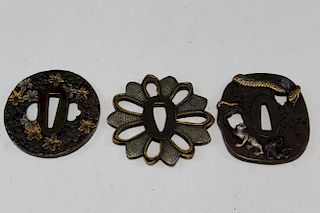 Three Japanese bronze tsubas.