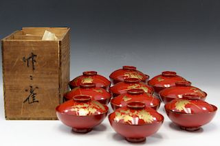 Ten Japanese lacquer bowls with covers.