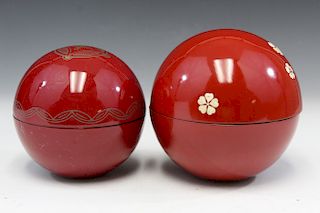 Two Japanese lacquer ball containers.