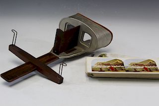Antique stereoscope viewer with pictures.