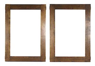 A Pair of Arts and Crafts Oak Frames, Height 43 1/4 x width 31 inches.