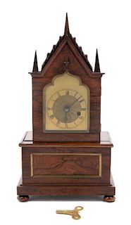A Gothic Revival Brass Mounted Mantel Clock<br>LA