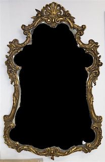 A Louis XV Style Gilt Mirror, Height 37 1/2 x width 24 1/2 inches.