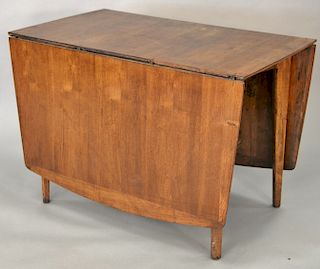 Mid Century drop leaf table, ht. 29 in., open: 42" x 72", closed: 24" x 42". 