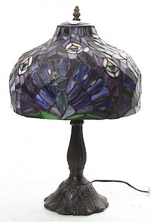 An American Leaded Glass Table Lamp, Height 18 3/4 x diameter of shade 12 inches.