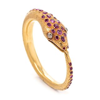A Victorian Yellow Gold, Ruby, and Diamond Ouroboros Snake Bangle Bracelet,