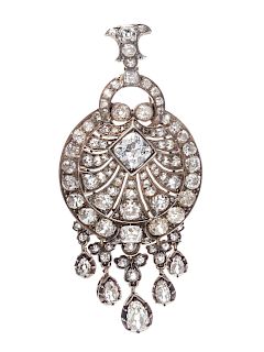 A Silver Topped Yellow Gold and Diamond Pendant/Brooch,