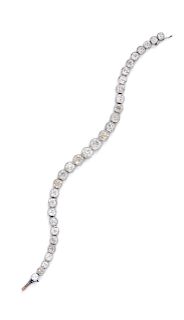 An Art Deco Platinum and Diamond Line Bracelet,