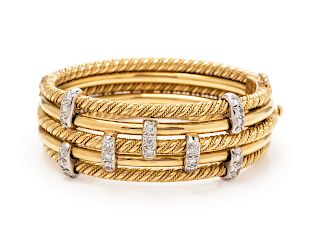 An 18 Karat Bicolor Gold and Diamond Bangle Bracelet, Suni,