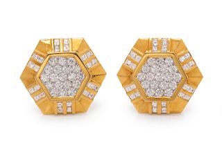 A Pair of 18 Karat Yellow Gold and Diamond Earclips,