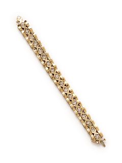 A 14 Karat Yellow Gold and Diamond Bracelet with Jacket,