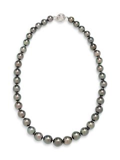 A 14 Karat White Gold, Diamond and Graduated Cultured Tahitian Pearl Necklace,