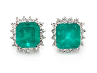 A Pair of Platinum, Emerald and Diamond Earclips,